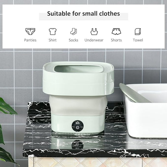 White compact washing machine on a marble countertop with text indicating suitability for small clothes.